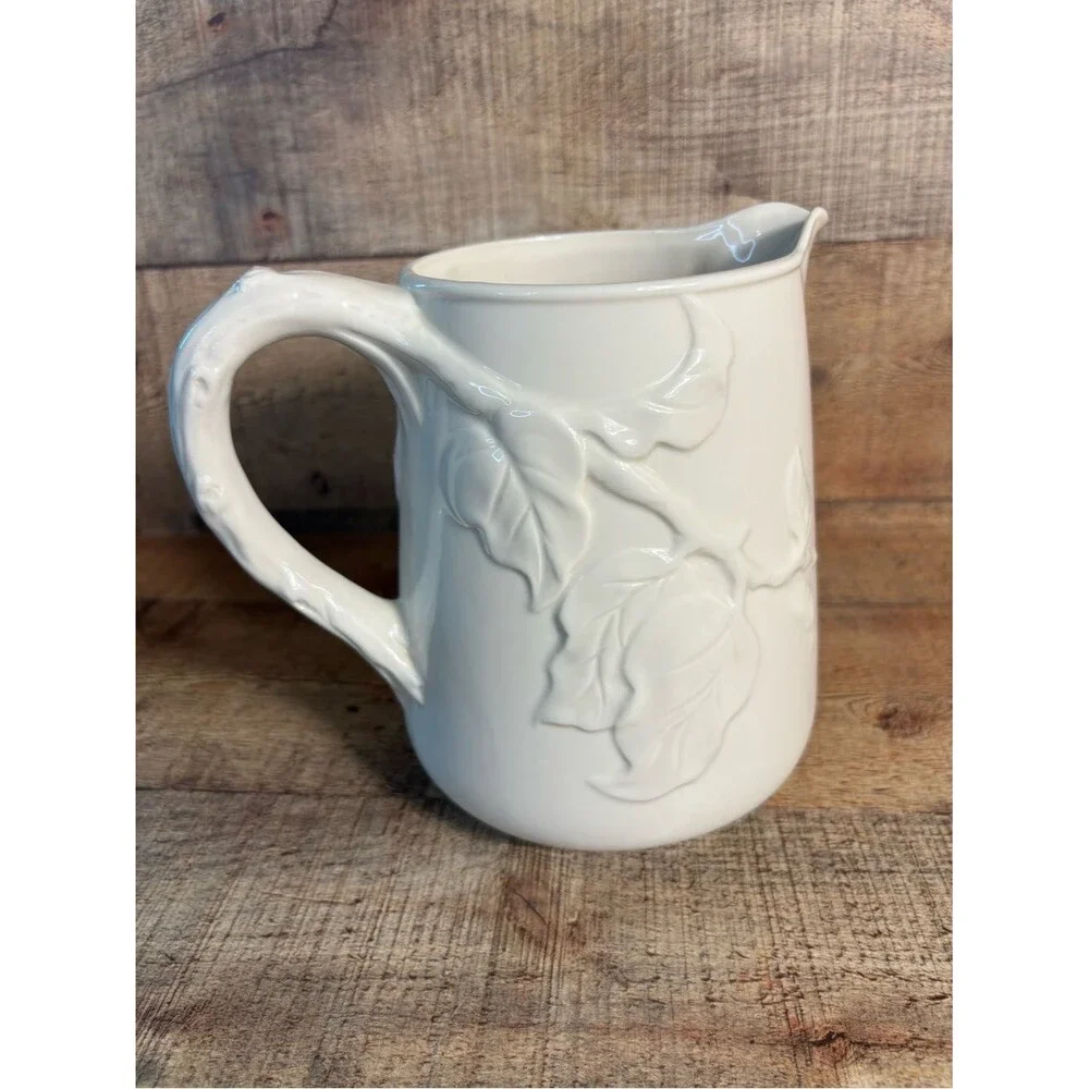 Peppertree Tabletops Pitcher Ivory Ceramic Pottery Embossed Fruit Design 6-3/4